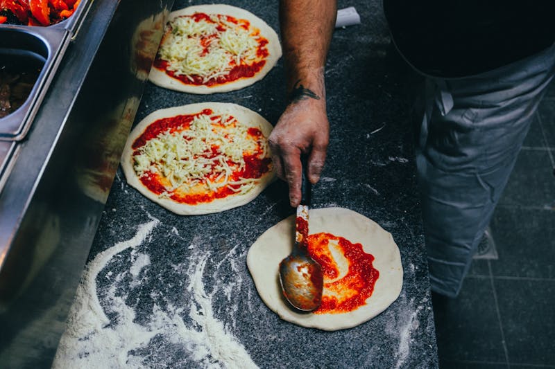 Green Lantern Pizza kitchen crafting handmade pizza