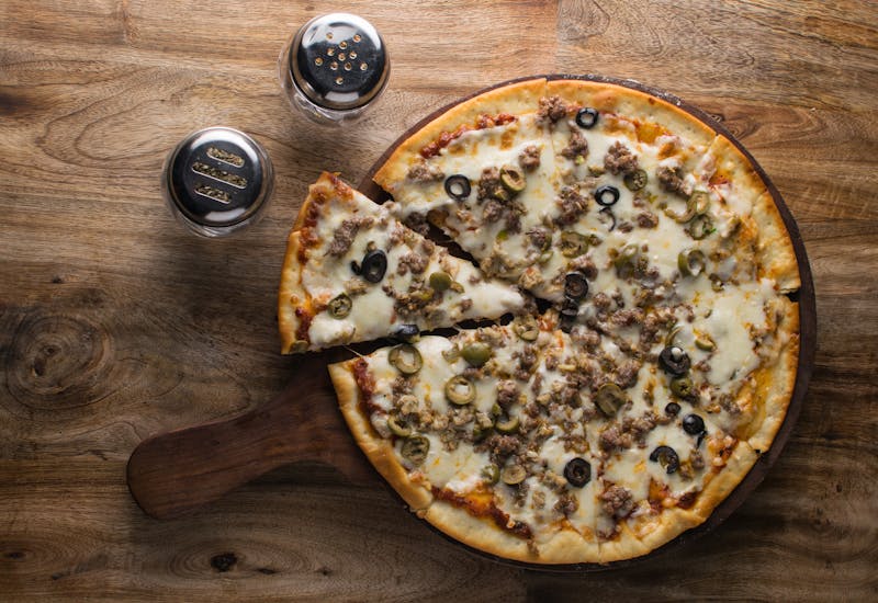 BBQ Smokehouse pizza with pulled pork and caramelized onions