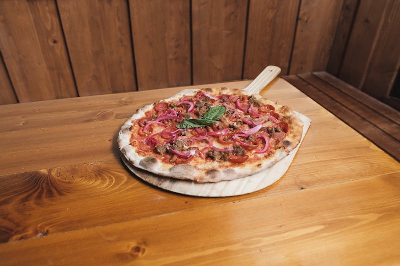 Spicy Diavola pizza with hot salami and chili flakes